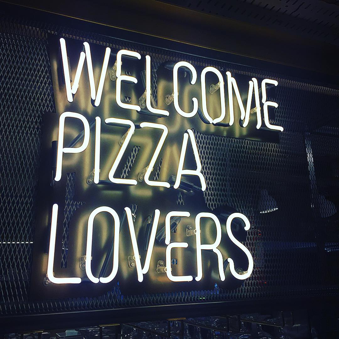 Welcome Pizza Lovers sign at Tivoli Food Hall